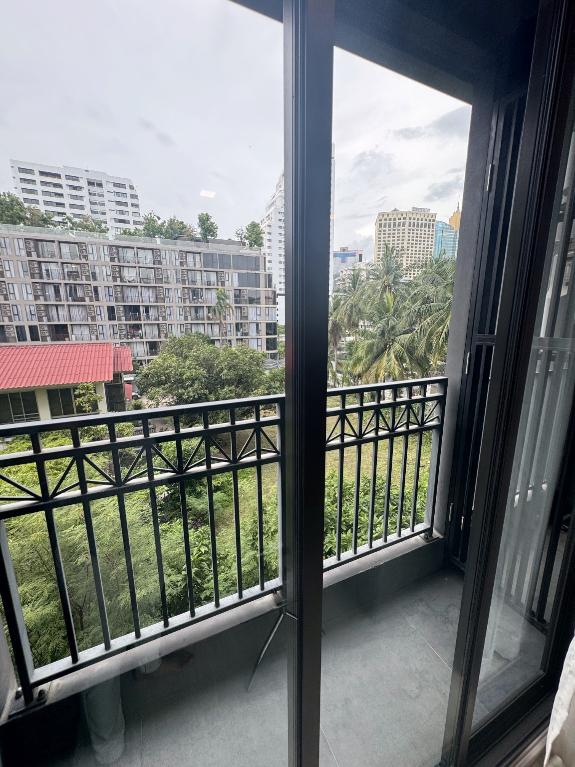 Private balcony with city and greenery views